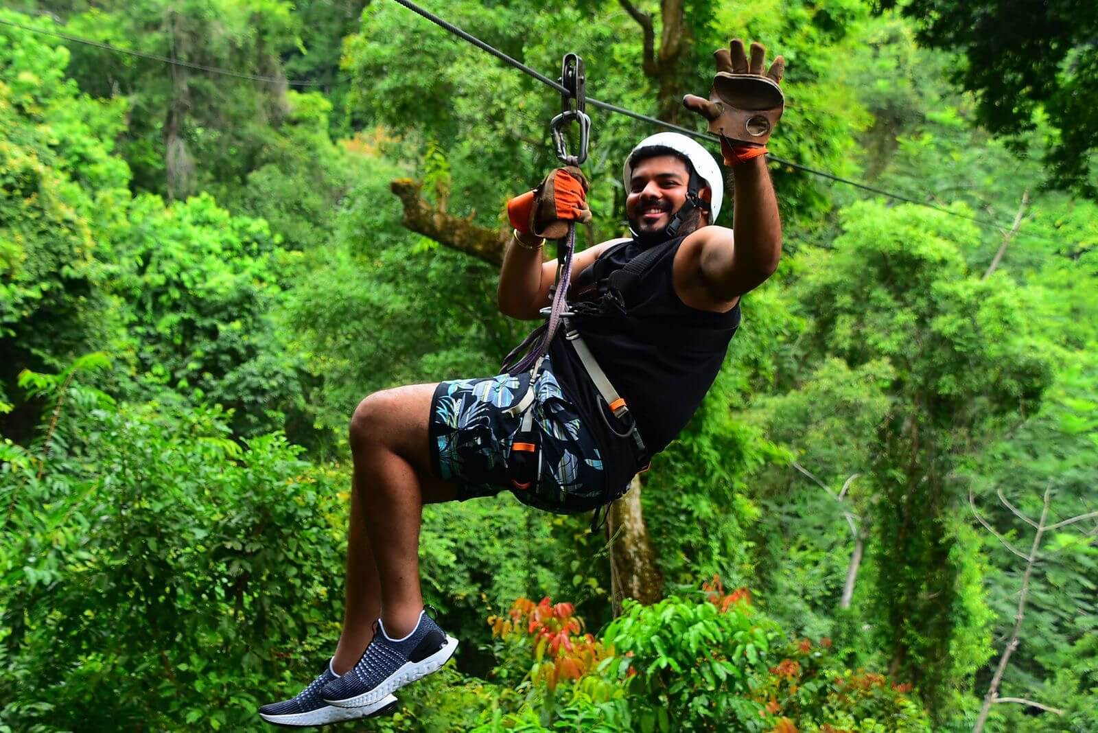 Enjoying a thrilling zipline ride over the Costa Rican jungle. Enjoying a thrilling zipline ride over the Costa Rican jungle.