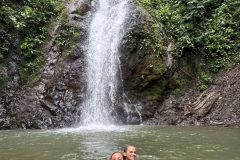 A scenic rainforest waterfall near Jaco, Costa Rica.