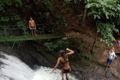 Cooling off in the natural pool beneath the waterfall.